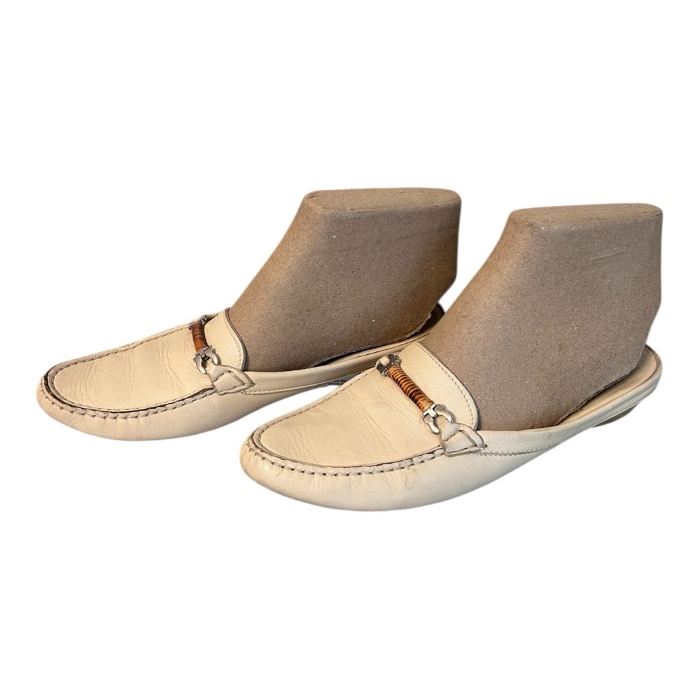 Salvatore Ferragamo Cream Loafers with Metal Accent
Open heel pointed toe